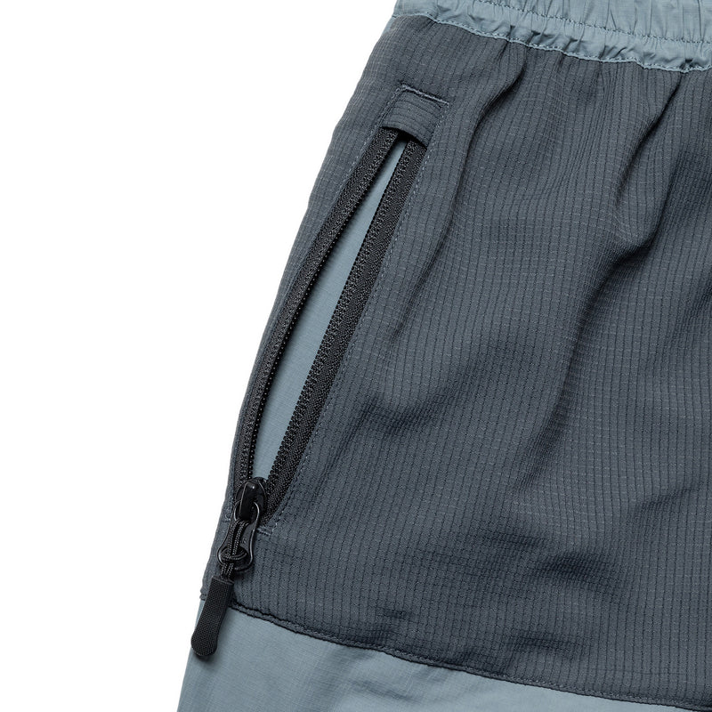 NYLON ZIP-UP PANTS<span>ナイロン ジップ-アップ パンツ［ユニセックス］</span>
